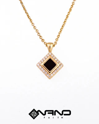Gold diamond-shaped halo pendant framing a dark square